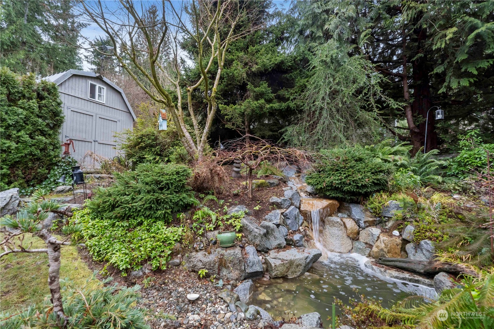4906 200th Street Southeast Bothell, WA 98012 - Photo 12 of 40 a backyard of a house with lots of green space