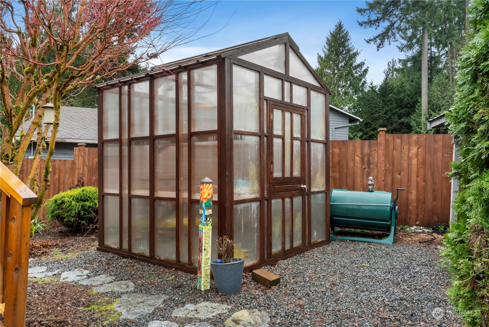 4906 200th Street Southeast Bothell, WA 98012 - Photo 13 of 40 a backyard of a house with lots of green space