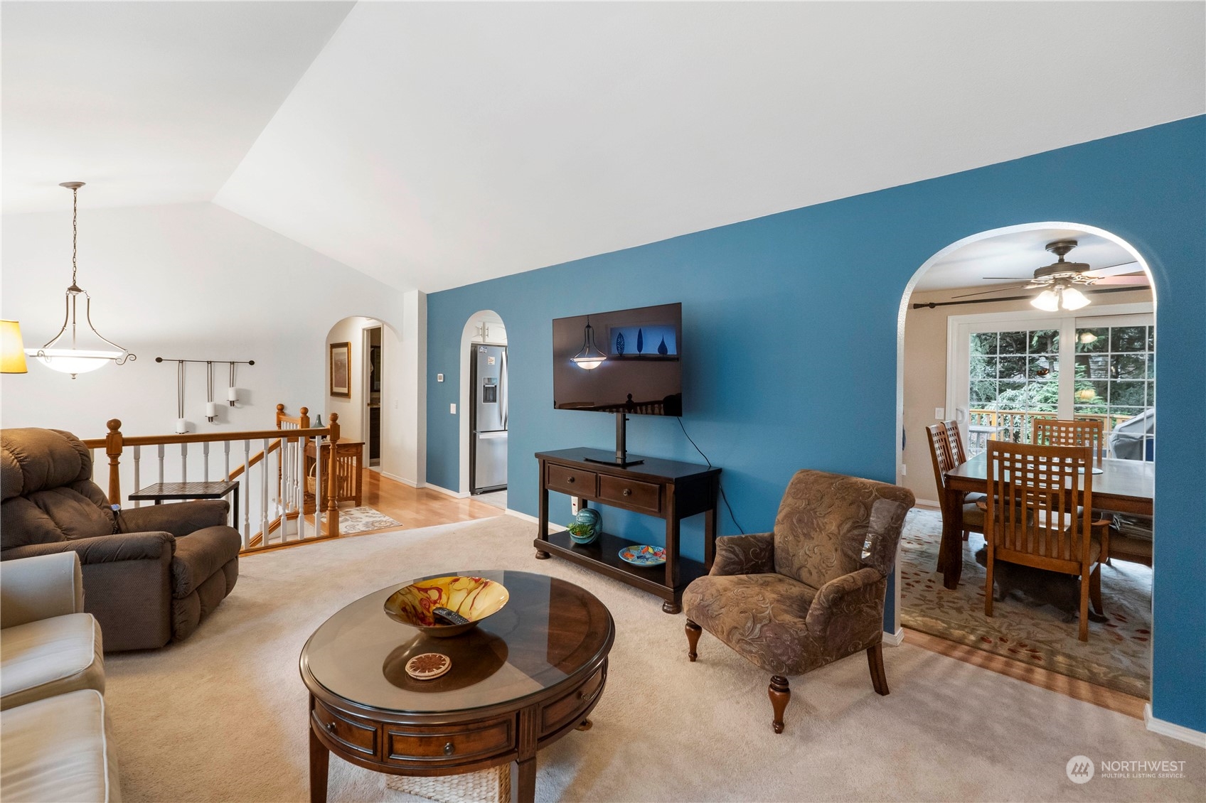 4906 200th Street Southeast Bothell, WA 98012 - Photo 20 of 40 a living room with furniture and a fireplace