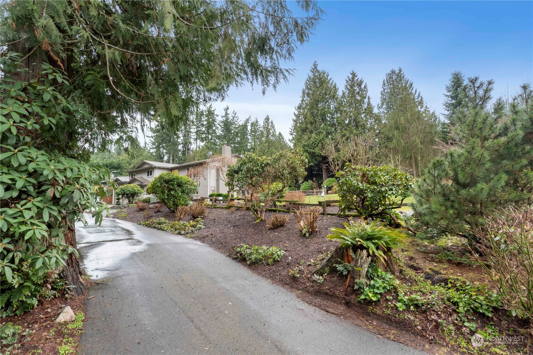 4906 200th Street Southeast Bothell, WA 98012 - Photo 3 of 40 a garden view with a sitting space