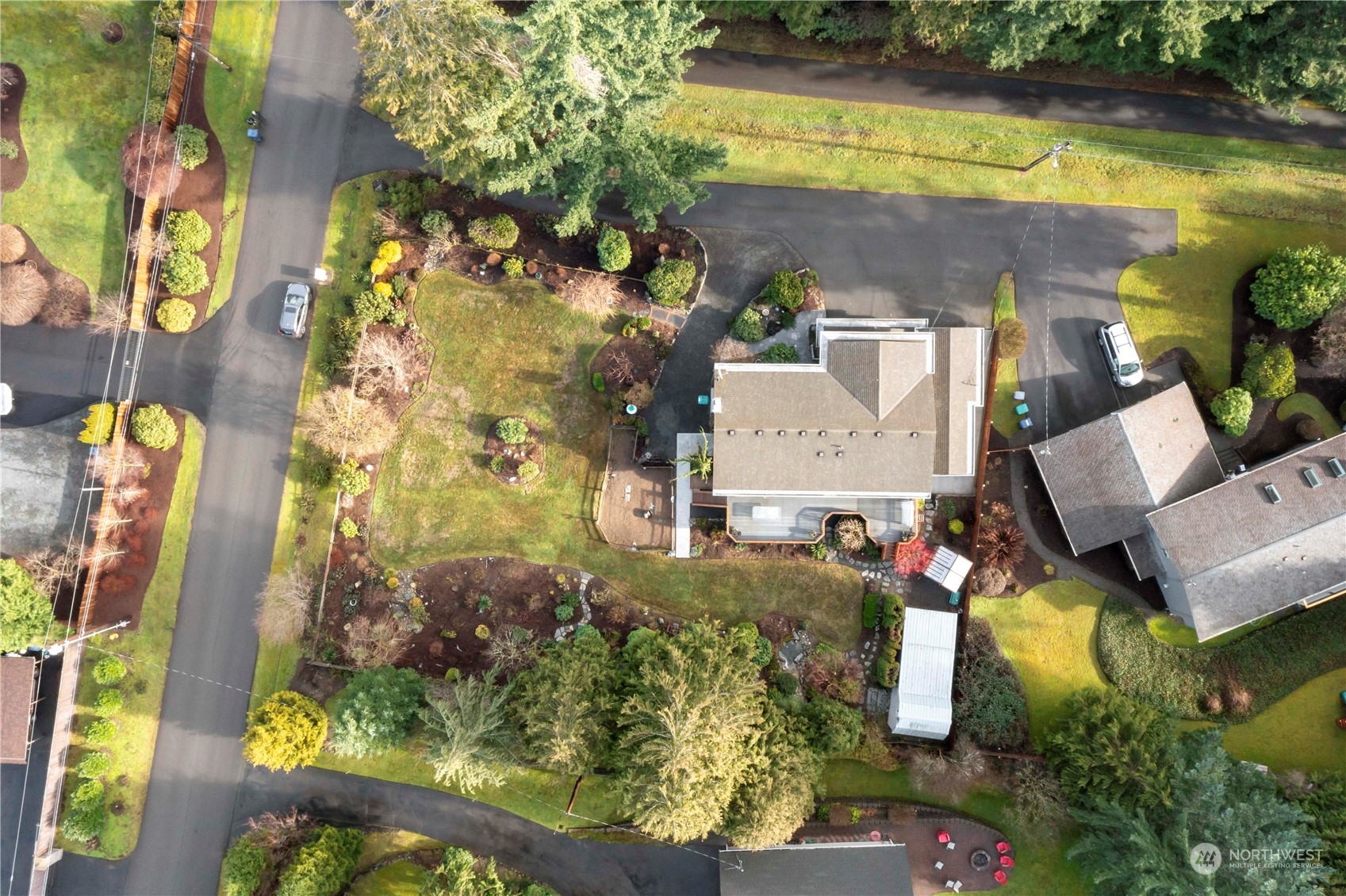 4906 200th Street Southeast Bothell, WA 98012 - Photo 7 of 40 an aerial view of a house with swimming pool