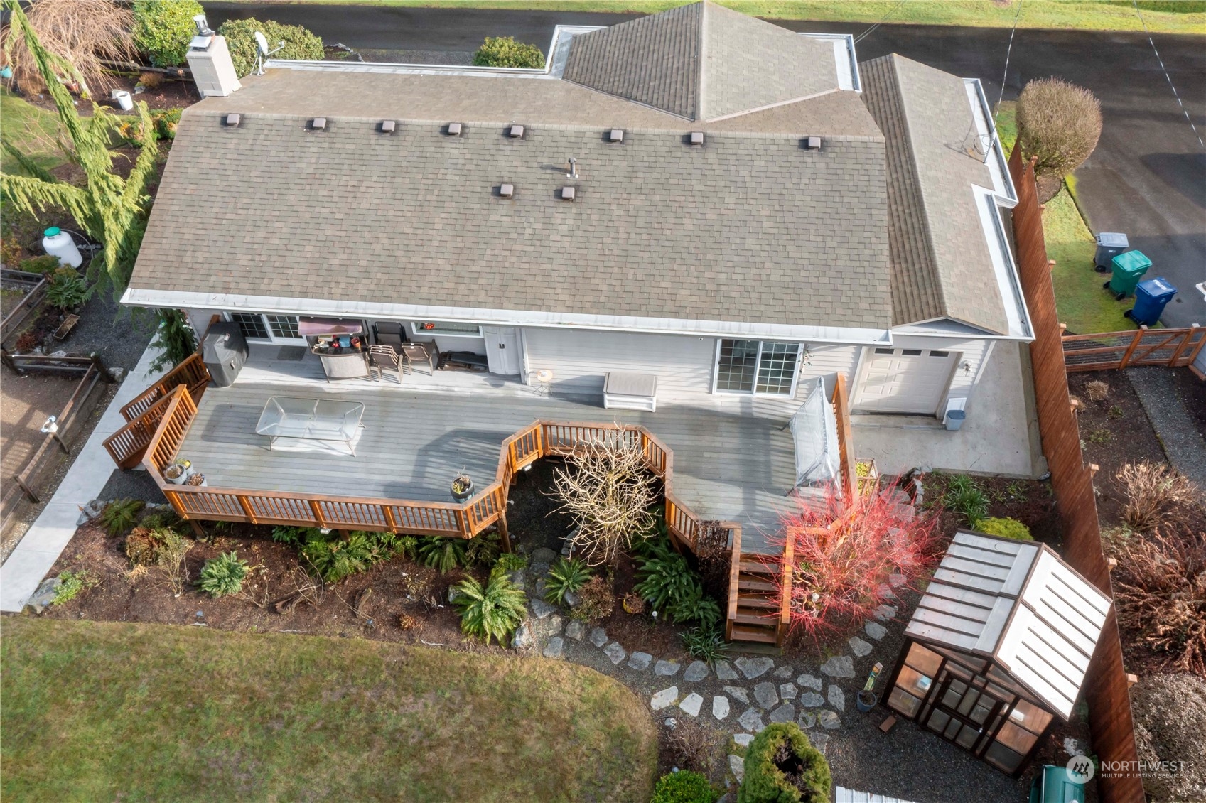 4906 200th Street Southeast Bothell, WA 98012 - Photo 9 of 40 an aerial view of a house with garden space and sitting area