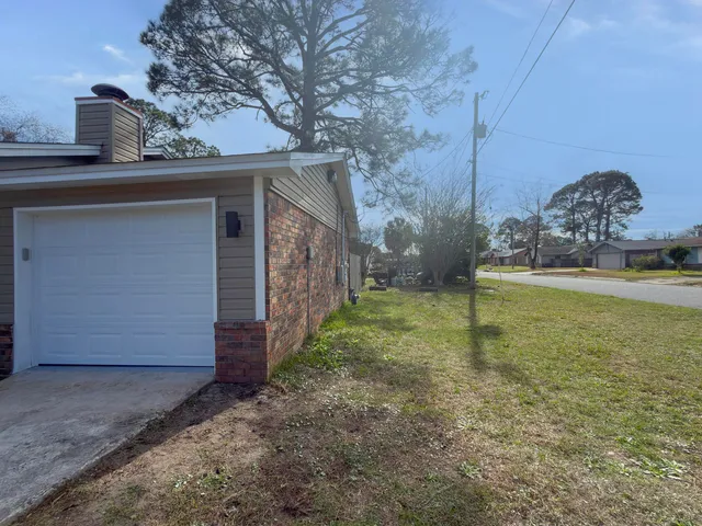 a view of a backyard with a trees