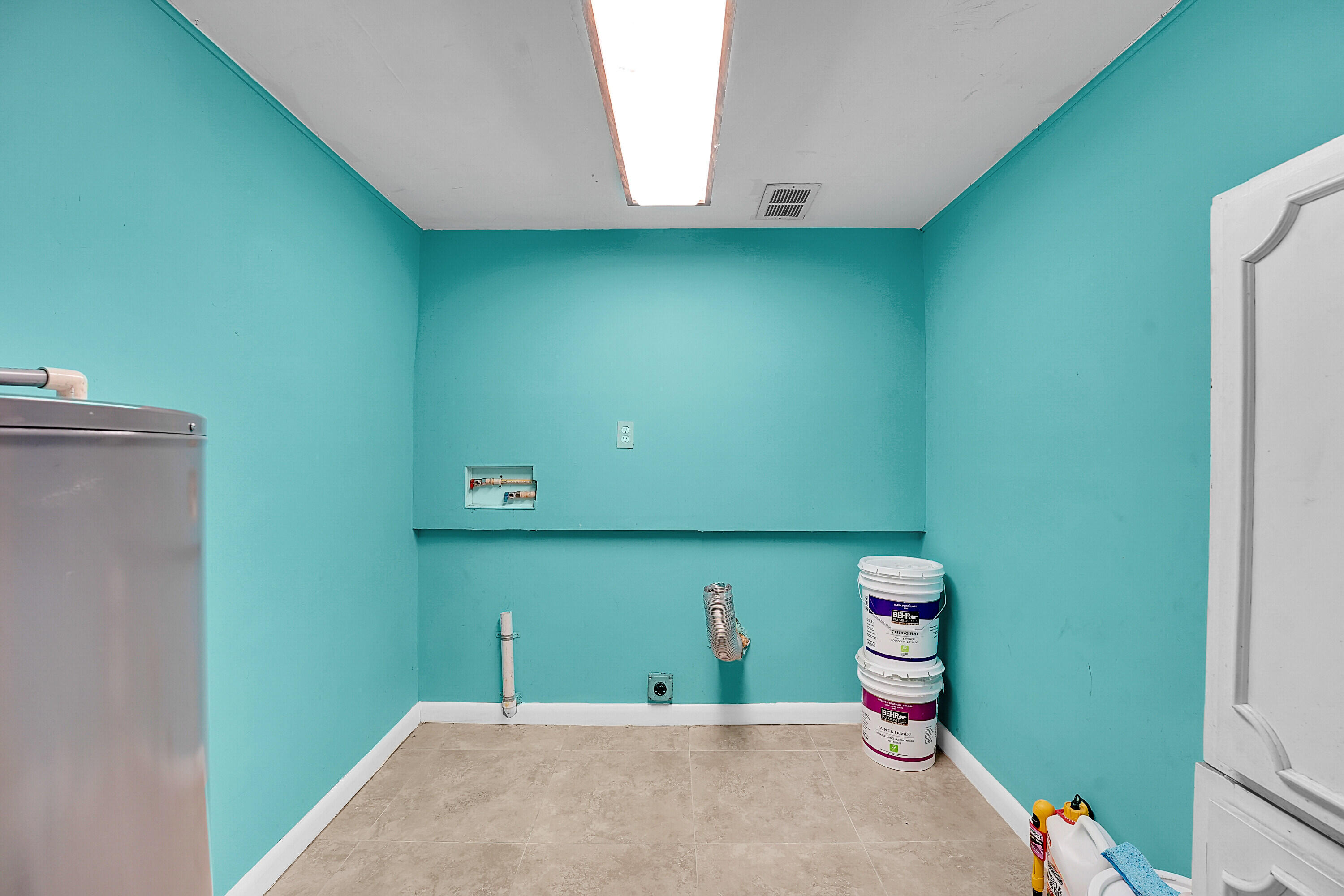 302 West Arbor Avenue Port St. Lucie, FL 34952 - Photo 18 of 25 a bathroom with a sink and a mirror