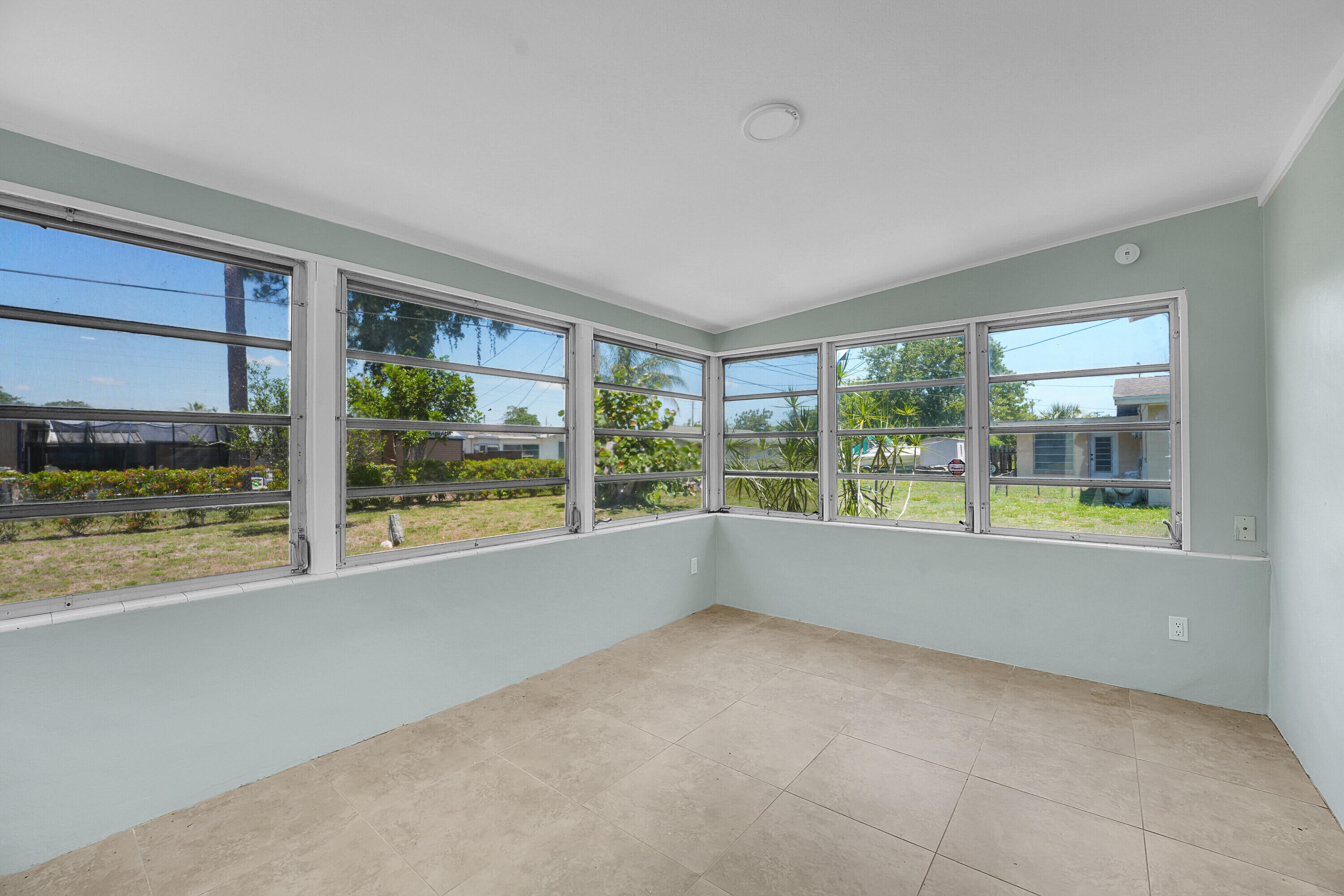 302 West Arbor Avenue Port St. Lucie, FL 34952 - Photo 20 of 25 a view of an empty room with a window