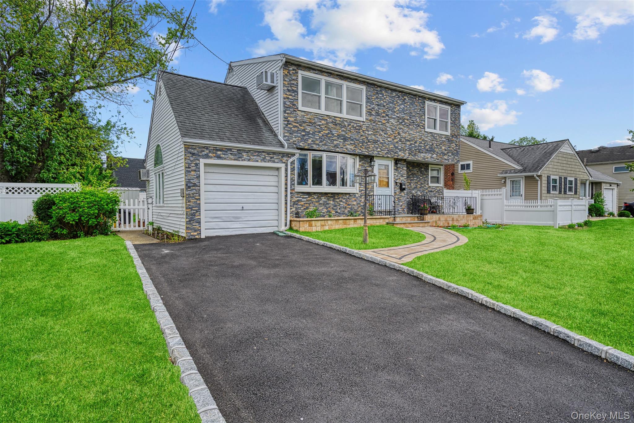21 Westgate Road Massapequa Park, NY 11762 - Photo 1 of 1 Front of Home