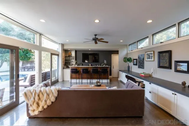 a view of living room and kitchen