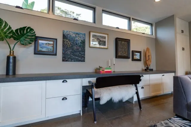 a view of house with a tree