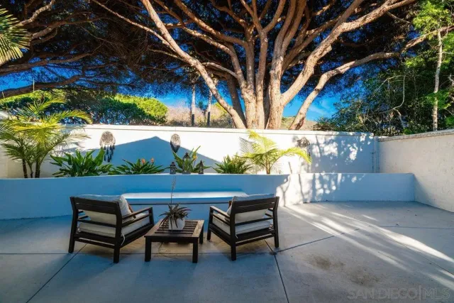 a kitchen with stainless steel appliances granite countertop a stove a sink dishwasher and a refrigerator