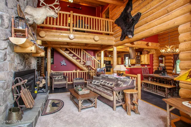 a roof deck with table and chairs