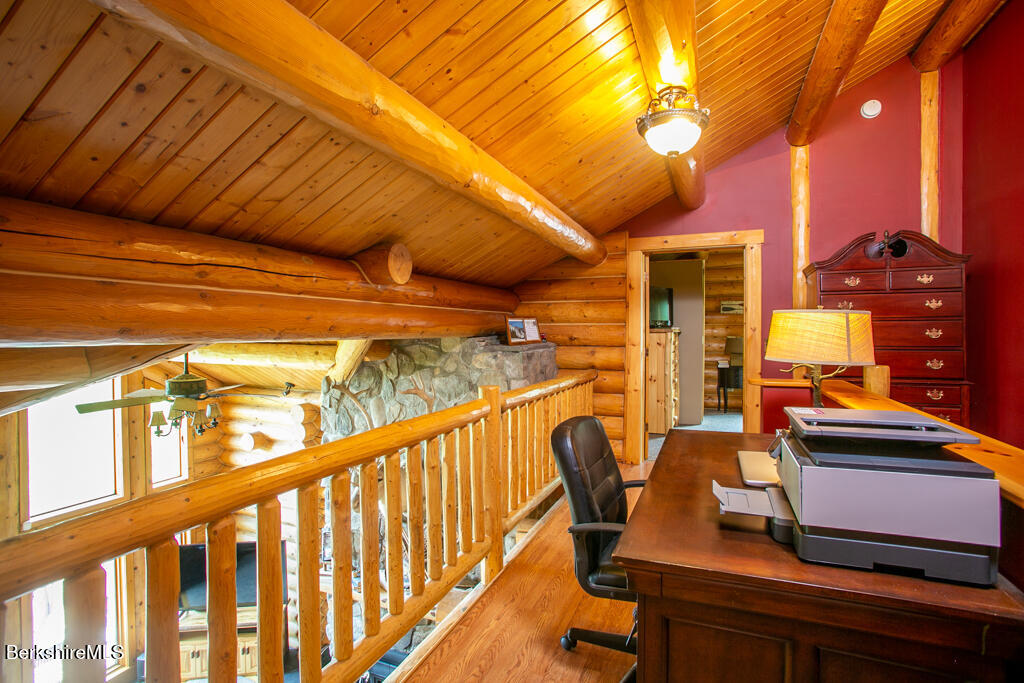 214 Mohawk Trail Florida, MA 01247 - Photo 22 of 40 a city view from a balcony with chairs