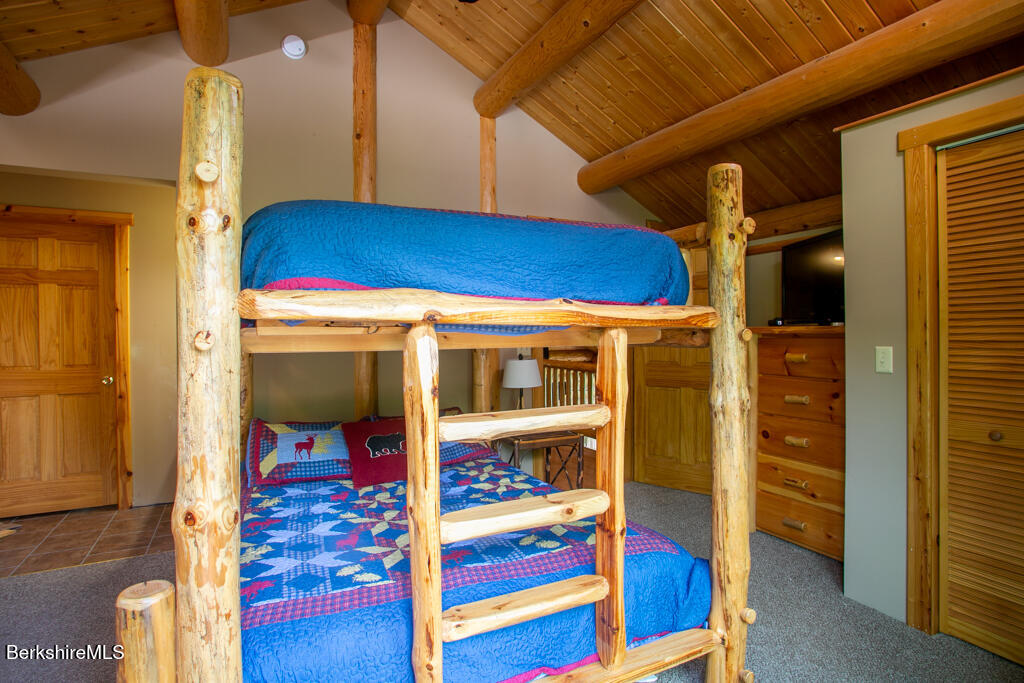 214 Mohawk Trail Florida, MA 01247 - Photo 23 of 40 a view of bedroom with a bed and furniture