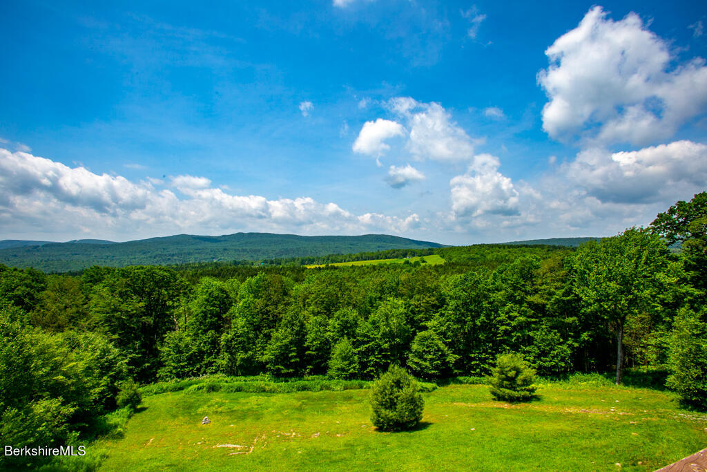 214 Mohawk Trail Florida, MA 01247 - Photo 29 of 40 a view of a lake with a yard