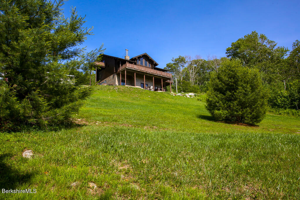 214 Mohawk Trail Florida, MA 01247 - Photo 34 of 40 a view of a house with a big yard