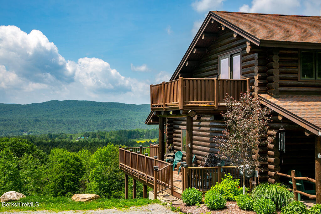 214 Mohawk Trail Florida, MA 01247 - Photo 8 of 40 a view of a house with a yard