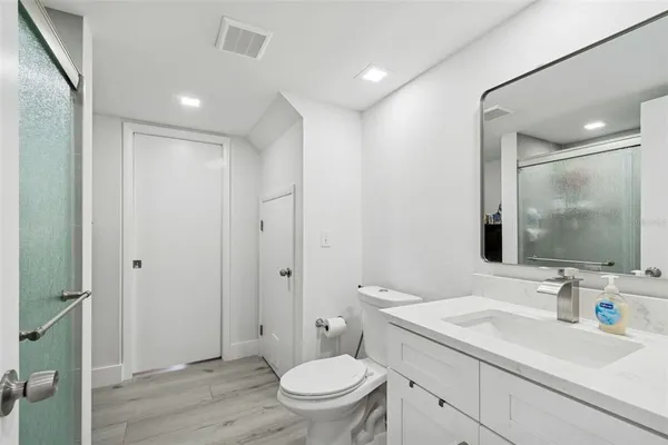 a view of entryway with wooden floor