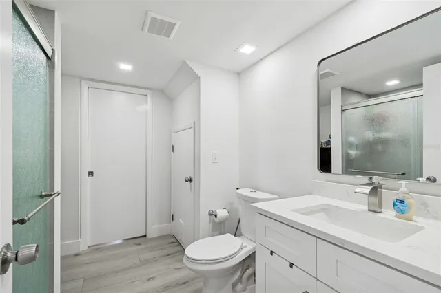 a view of entryway with wooden floor