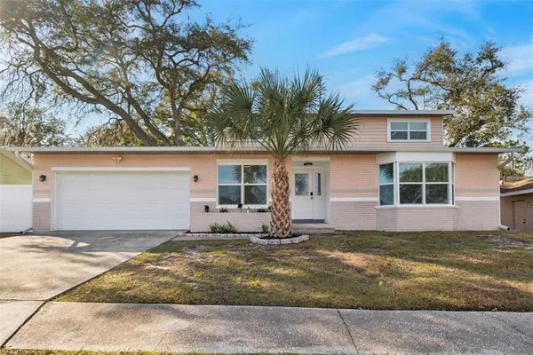 front view of a house with a yard