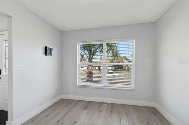 a bathroom with double sink and a mirror