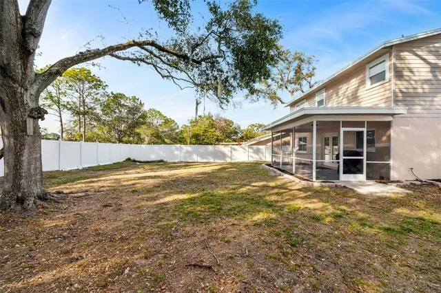 a view of a room with a large window