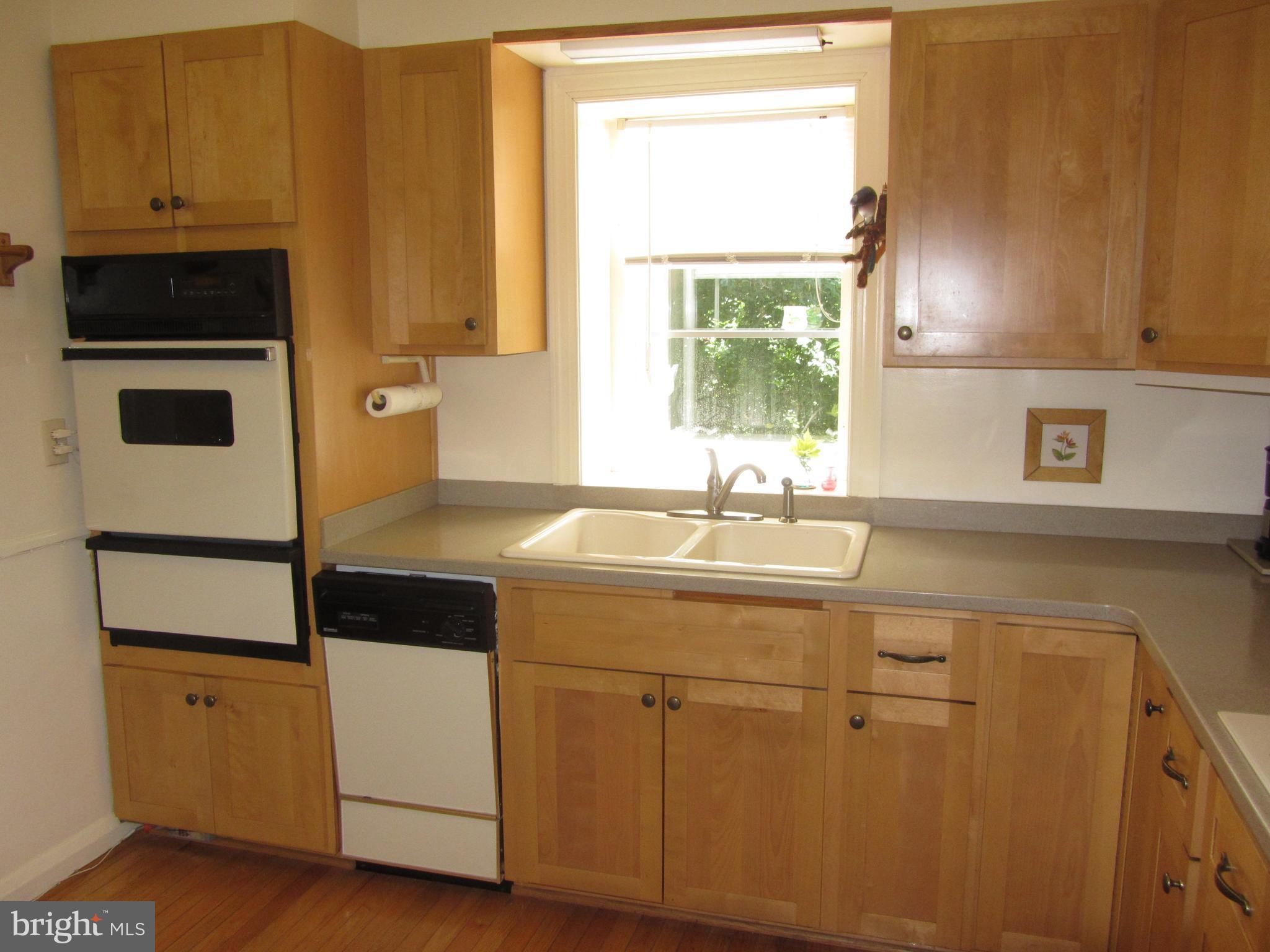 417 Range Road Baltimore, MD 21204 - Photo 5 of 30 Kitchen with Corian Counters