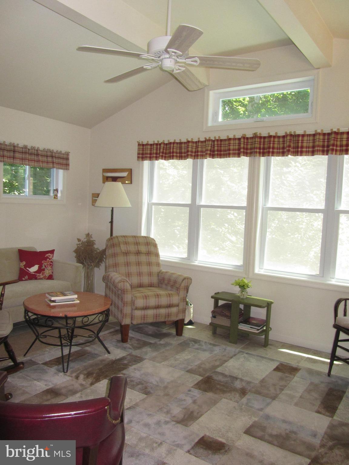 417 Range Road Baltimore, MD 21204 - Photo 7 of 30 Family Room with Vaulted Ceiling