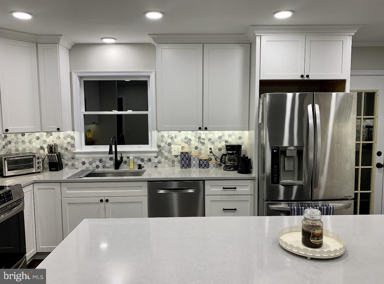 230 Richards Ferry Road Fredericksburg, VA 22406 - Photo 8 of 13 Modern kitchen with sleek finishes.