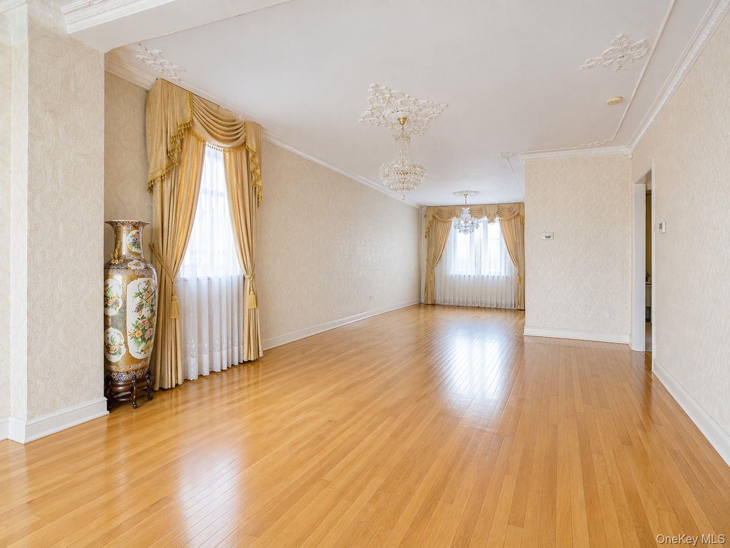 102-01 62nd Road Queens, NY 11375 - Photo 2 of 16 a view of livingroom and hardwood