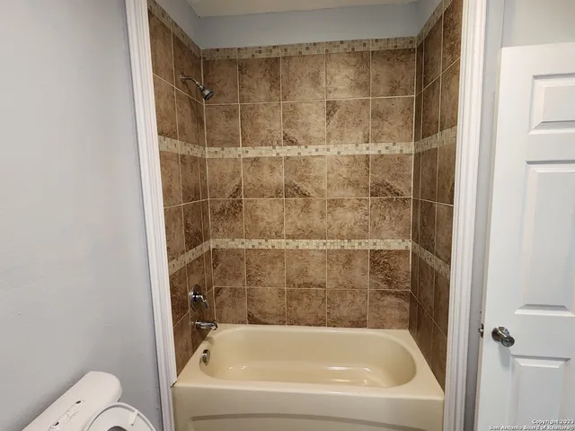 a bathroom with a bathtub