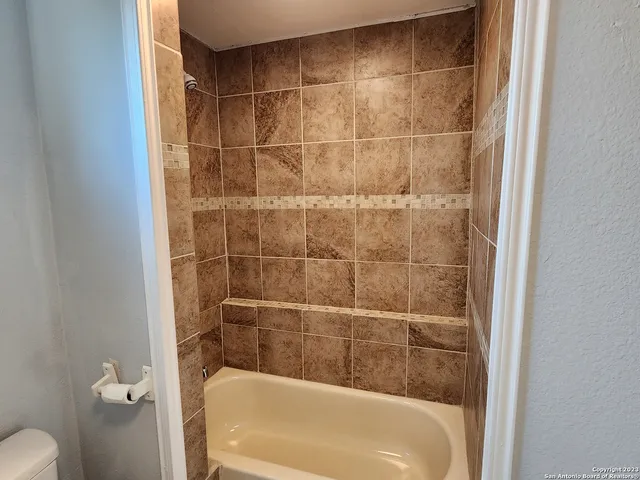 a bathroom with a bathtub