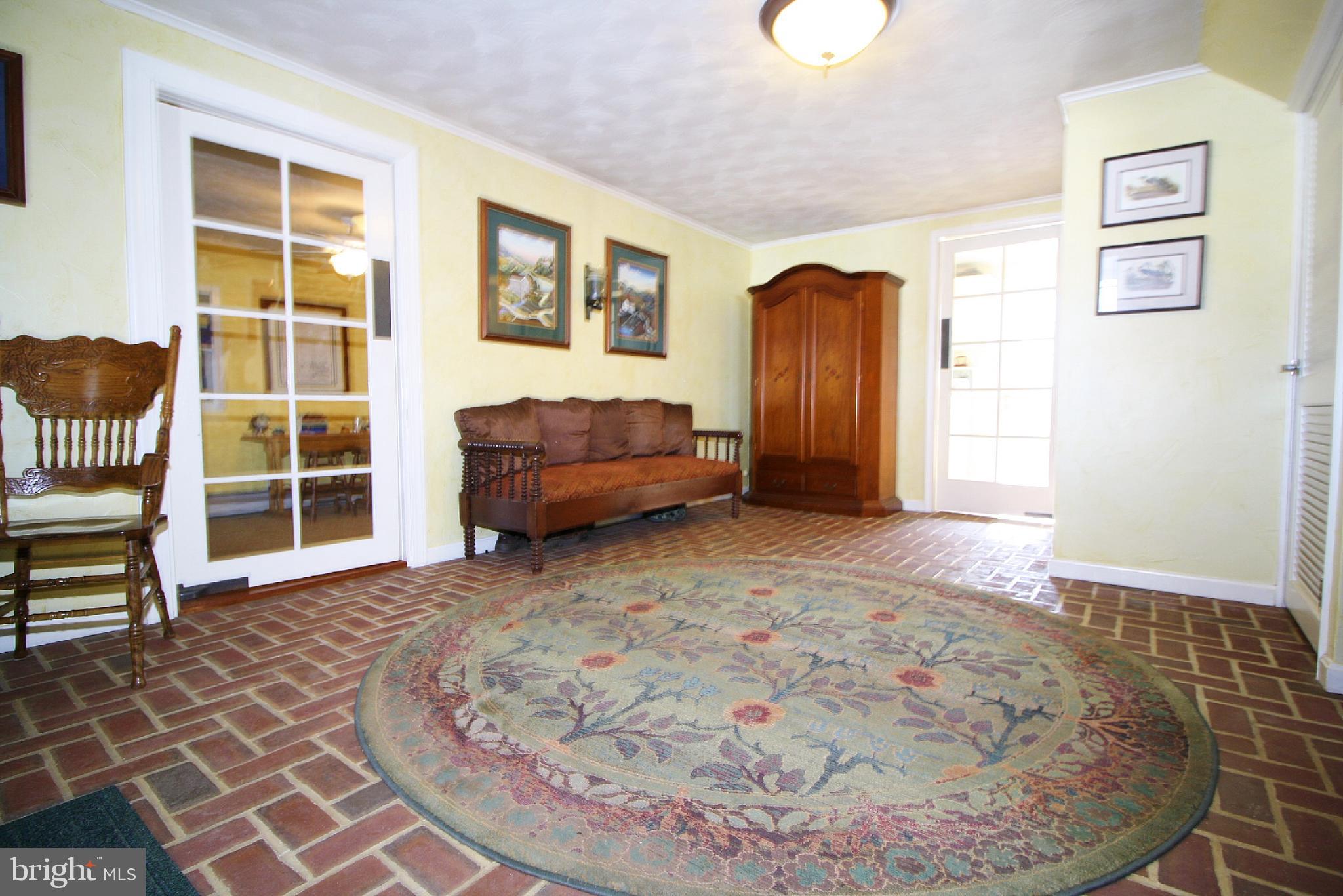 3453 Bowser Road New Freedom, PA 17349 - Photo 14 of 65 a view of a livingroom with furniture and cabinet