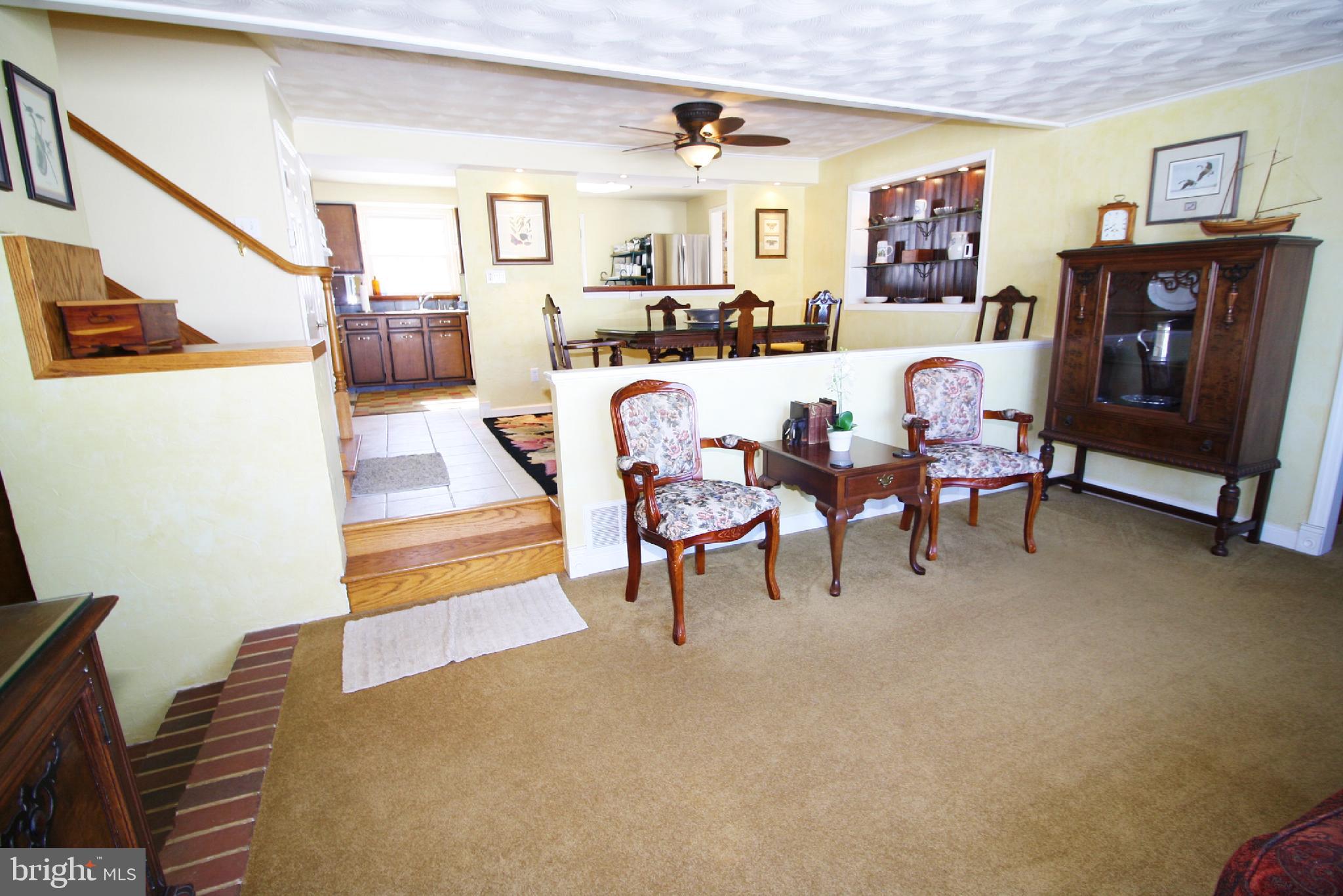 3453 Bowser Road New Freedom, PA 17349 - Photo 22 of 65 a living room with furniture and a fireplace