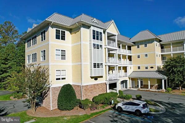 a front view of a multi story residential apartment building