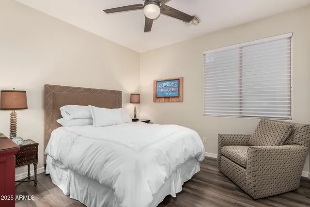 a view of a patio with swimming pool and sitting area
