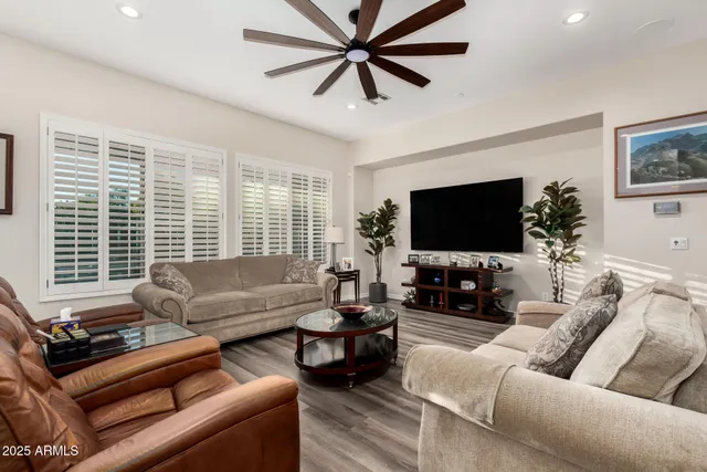 a kitchen with sink table and chairs