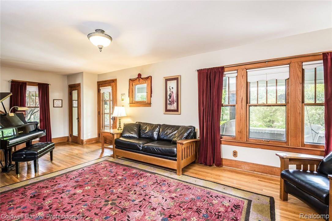 21591 Garfield Road Northville, MI 48167 - Photo 18 of 90 SPACIOUS LIVING ROOM WITH ORIGINAL HARDWOOD FLOORING
