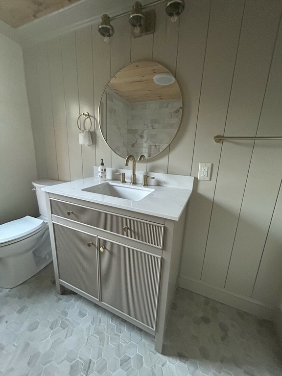 13 Donna Road Holbrook, MA 02343 - Photo 18 of 31 a room with a sink and mirror