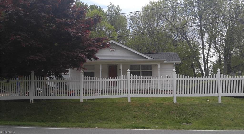 346 Fairgrove Road Thomasville, NC 27360 - Photo 1 of 14 Welcome to your home with the white picket fence!