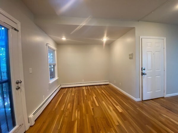 131 West Seventh Street, Unit 2 Boston, MA 02127 - Photo 7 of 11 a view of wooden floor in an empty room