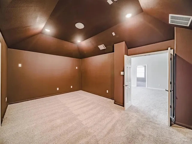 a view of a bathroom with a tub and toilet