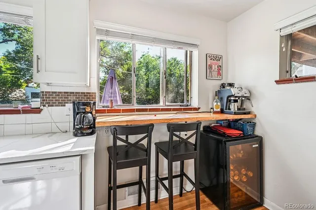 a kitchen with a stove and a sink