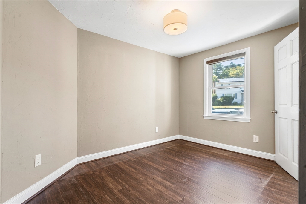 40 Randolph Street Canton, MA 02021 - Photo 23 of 35 a view of a room with wooden floor and windows