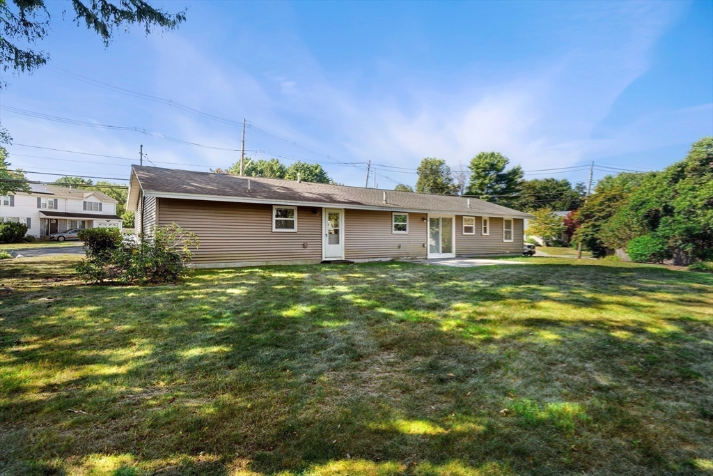 40 Randolph Street Canton, MA 02021 - Photo 29 of 35 a front view of house with yard having outdoor seating