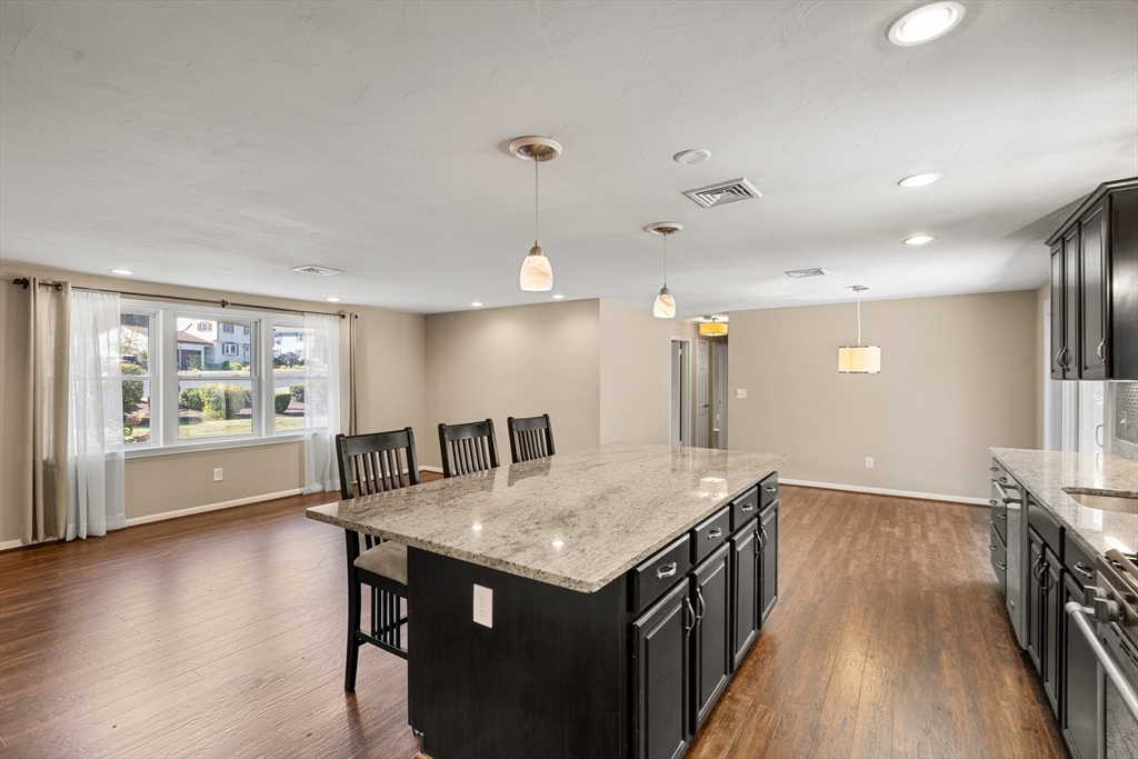 40 Randolph Street Canton, MA 02021 - Photo 7 of 35 a kitchen with a table and chairs