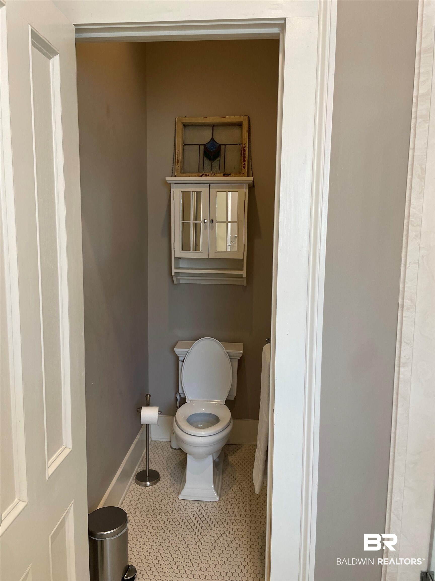 1001 Augusta Street Mobile, AL 36604 - Photo 19 of 26 Bathroom with tile patterned floors and toilet
