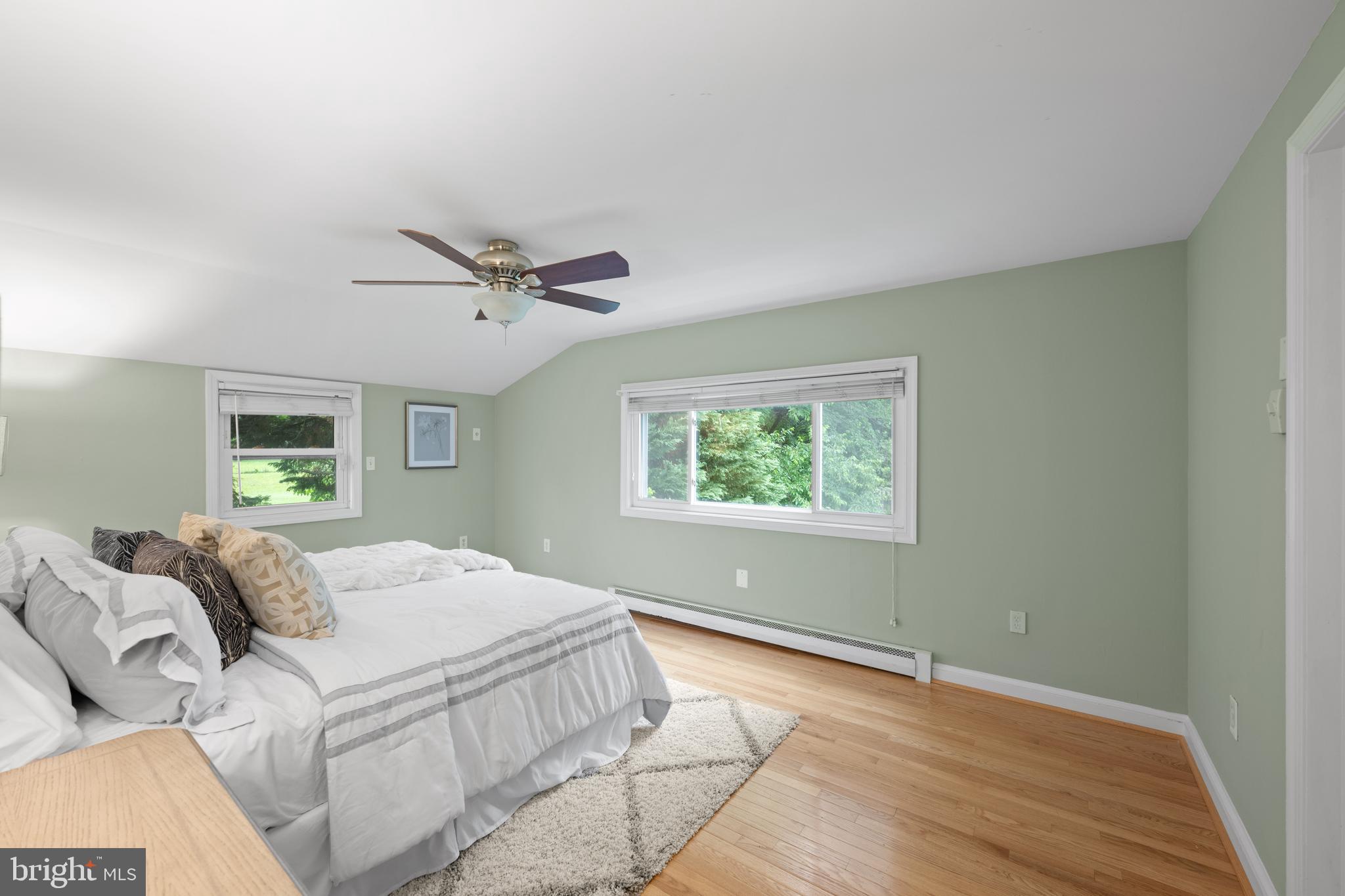 403 East Melbourne Avenue Silver Spring, MD 20901 - Photo 16 of 33 a bedroom with a bed and window