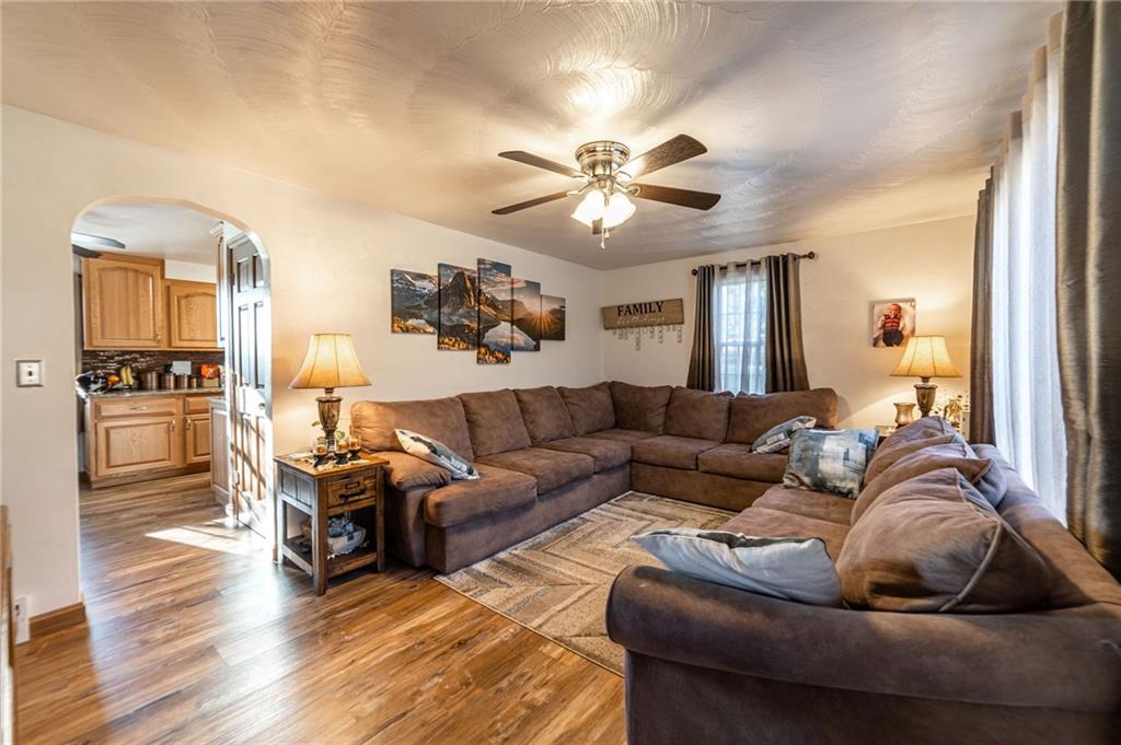 319 Moran Road Butler, PA 16002 - Photo 3 of 24 a living room with furniture and wooden floor