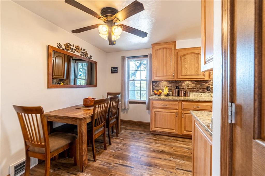 319 Moran Road Butler, PA 16002 - Photo 6 of 24 a kitchen with a table chairs refrigerator and cabinets