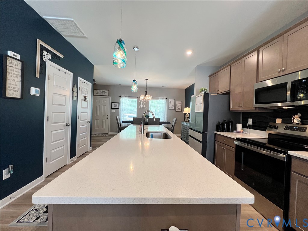 223 Whiteside Road Sandston, VA 23150 - Photo 11 of 22 Expansive kitchen island featuring a light-toned c