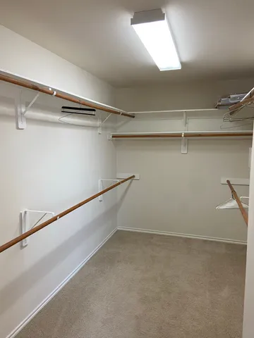 a view of a room with racks on the wall